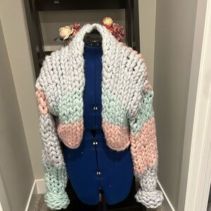 Homemade hand knitted sweater.  Fits most sizes.